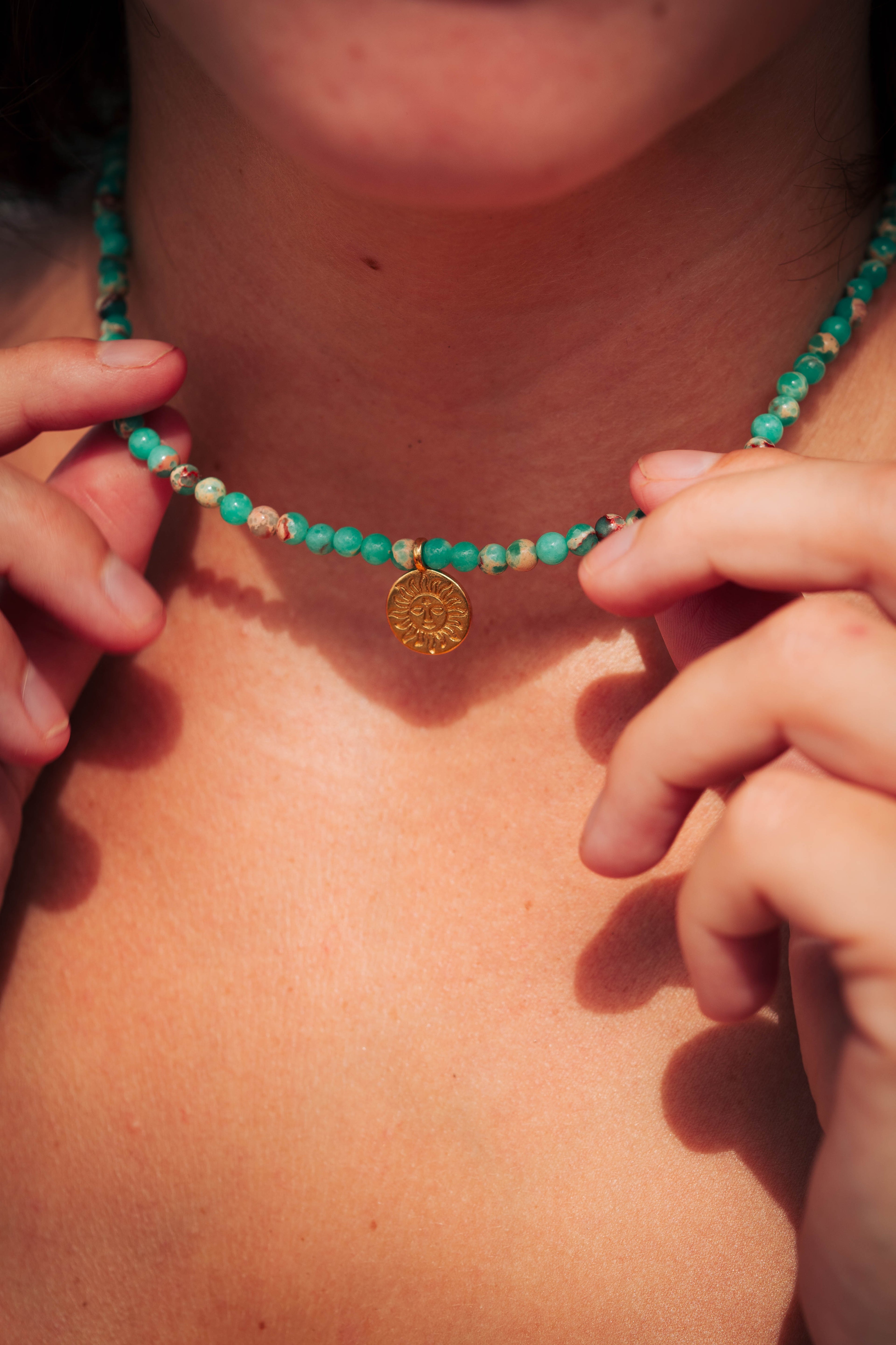 שרשרת שמש ג׳ספר ירוק